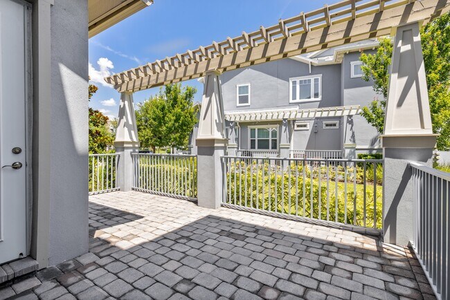 Building Photo - Move In Ready End Unit Townhome in Laureate Park | 3 Bed | Tesla Charger