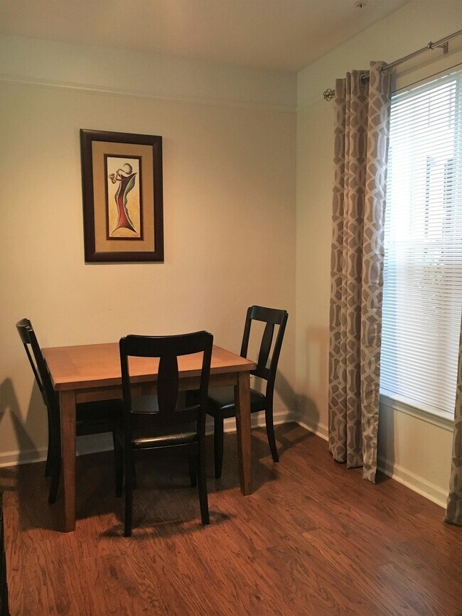 Building Photo - Townhouse in Gated Community with Attached...