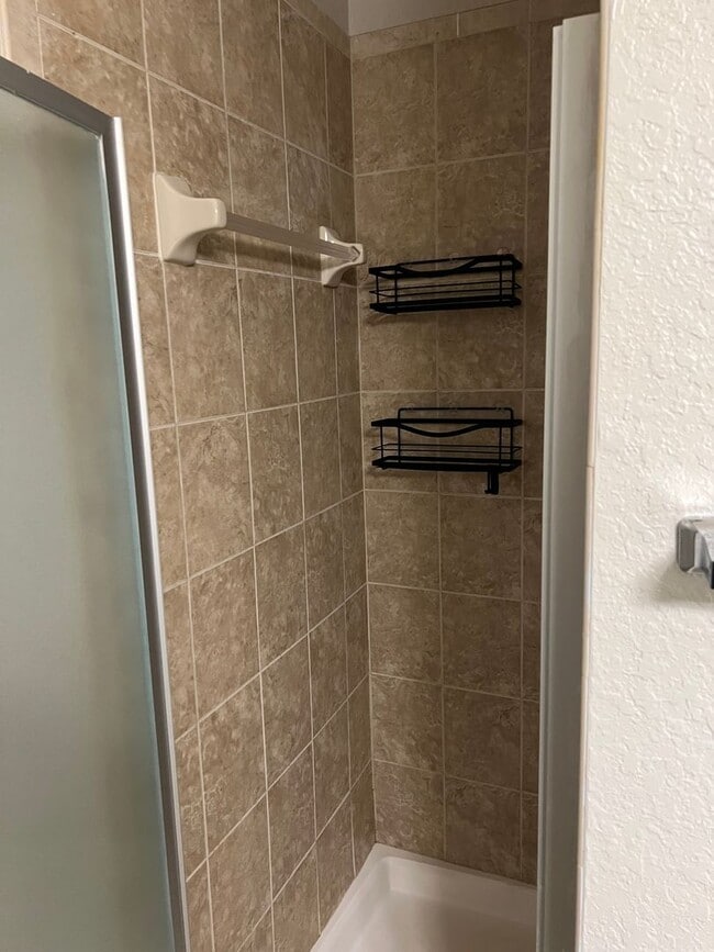 Building Photo - Spacious 3BR/2BA Gated Condo with Resort-Style Amenities!