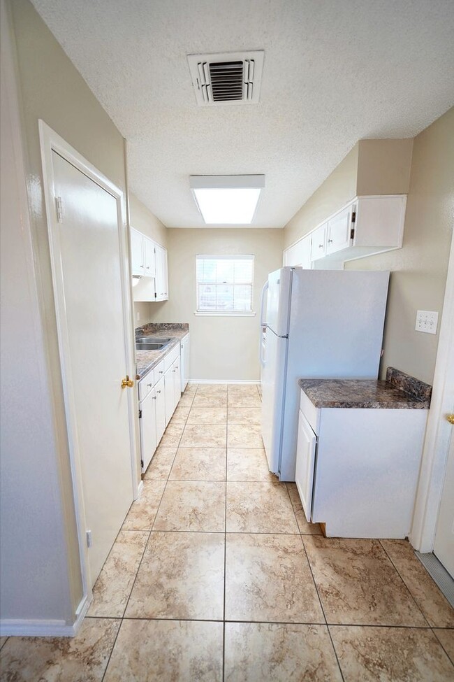 Building Photo - Move-In Ready 4-Bedroom Gem in the Heart o...