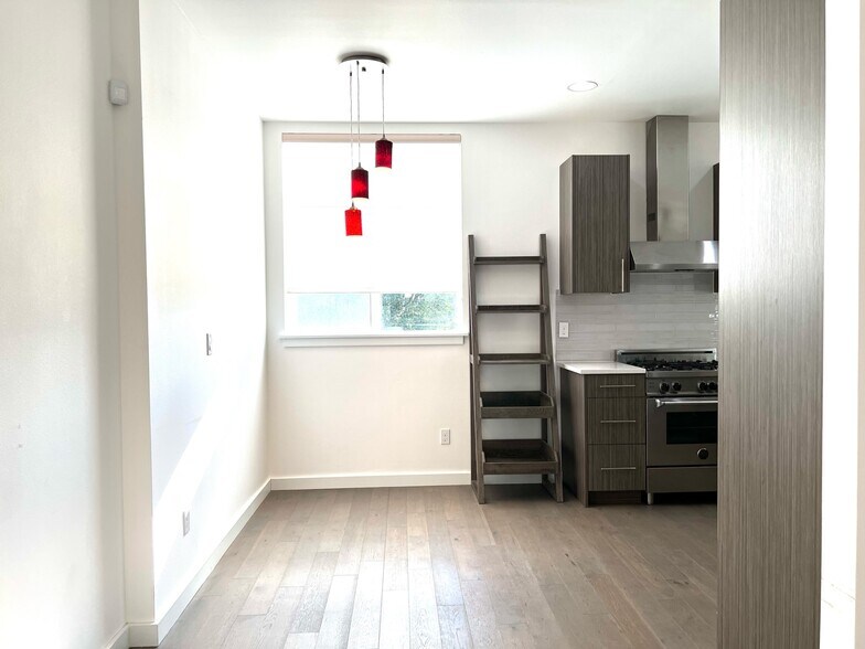 Dining area off of the kitchen. - 211 13th Ave E