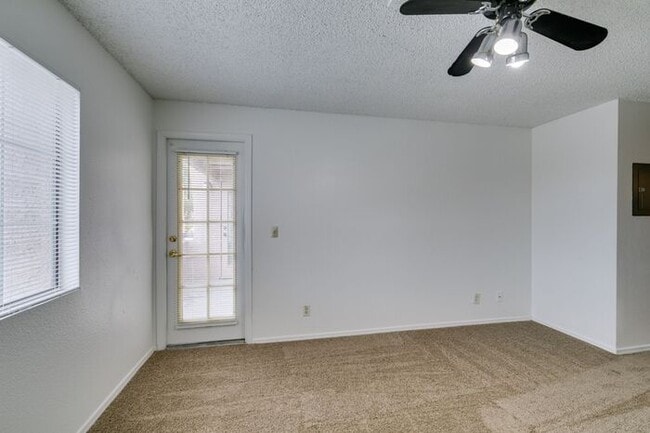 Building Photo - Charming Second-Floor Condo with Two Bedrooms and Fireplace