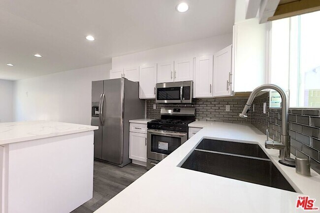 Building Photo - 17610 Sherman Way