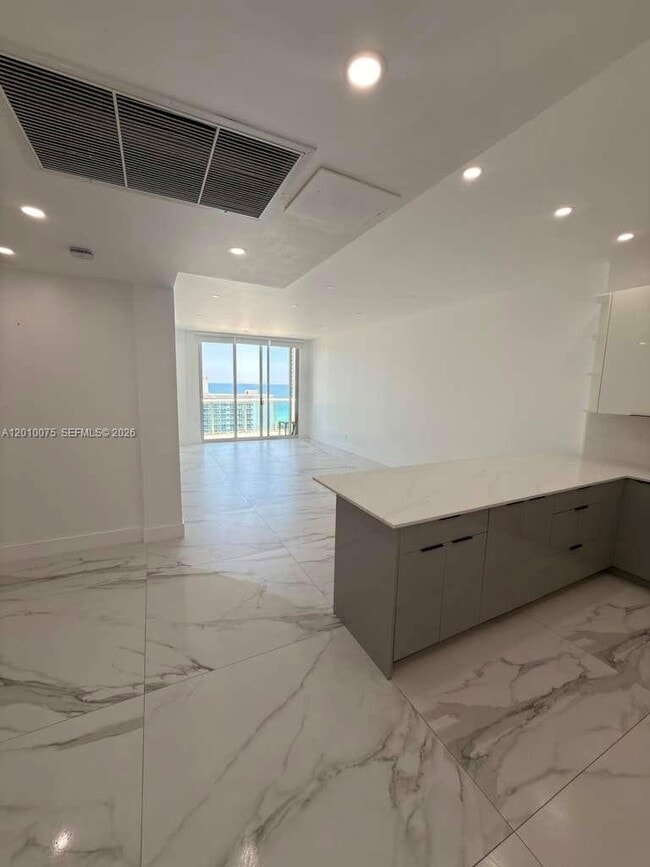 Building Photo - 19370 Collins Ave