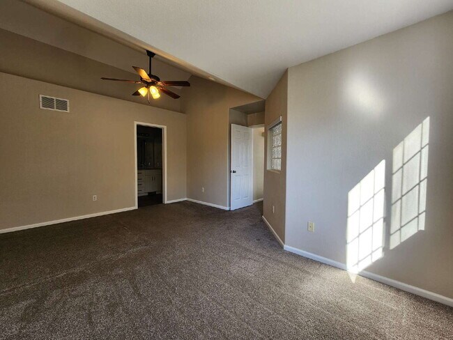 Building Photo - Spacious Two-Suite Townhome With Garage, Fireplace And Community Pool