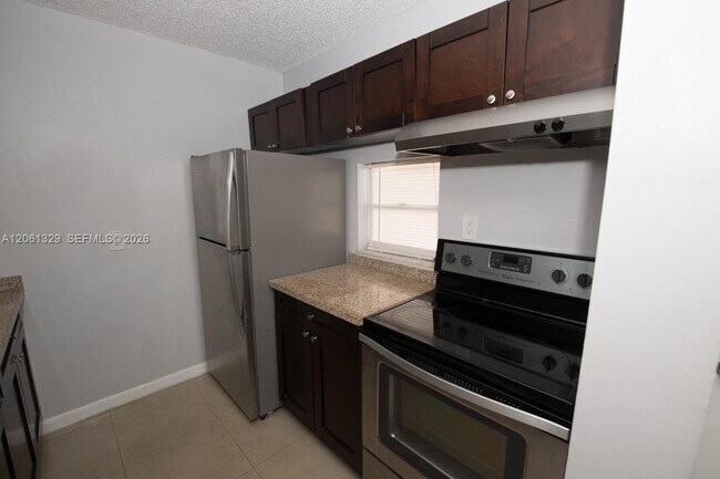 Building Photo - 8550 N Sherman Cir