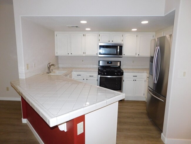 Building Photo - Gorgeous 3 bedroom condo with a 2 car garage! Tons of upgrades*Southwest*Gated community*