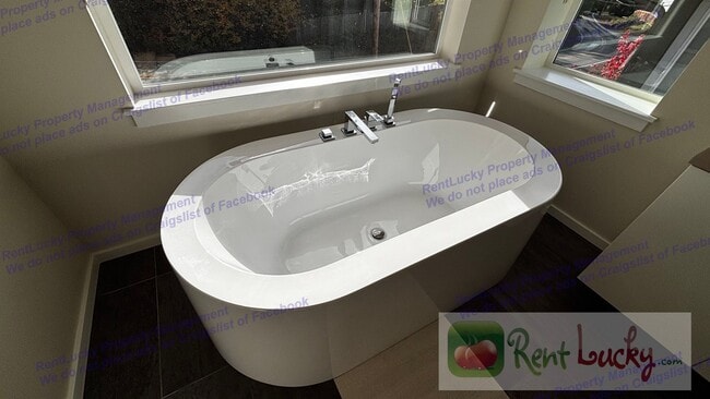 Building Photo - STUNNING 4-Bedroom Lake Tapps Home w/2-Car...