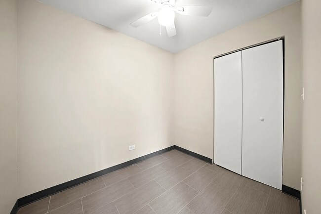 Building Photo - Spacious 2BR, 2BA Haven with Hardwood Elegance right across from Humboldt Park!
