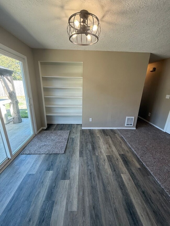 Building Photo - Updated 3+ Bedroom 2 Bath House with Large Fenced In Yard