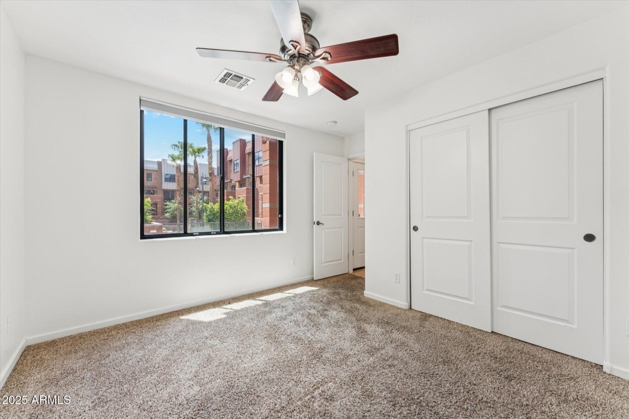 first floor bedroom with view of pool - 330 S Farmer Ave