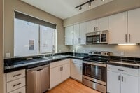 Building Photo - Move in Special OAC.. Modern Desert Living in the Heart of Downtown with PRIVATE GARAGE!!