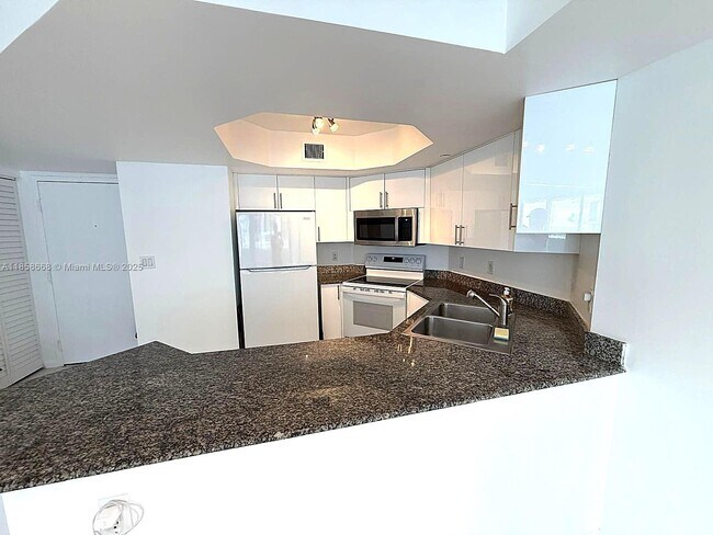 Building Photo - 8911 Collins Ave