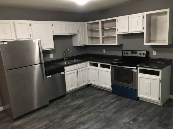 Kitchen- Cabinet install in progress in this picture - 1002 Graceland Ave