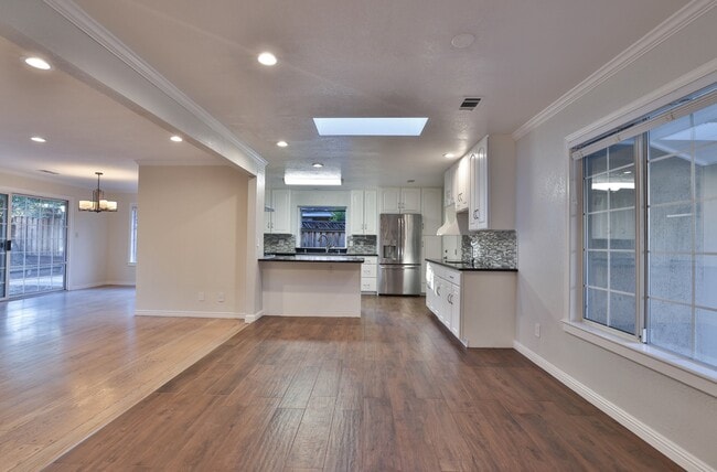 Building Photo - Bright 4BR Los Altos Retreat with Central A/C, Attached Garage & In-Unit Laundry