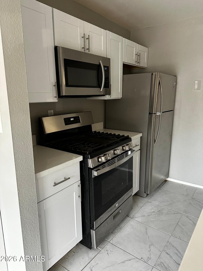 Building Photo - 1701 W Tuckey Ln