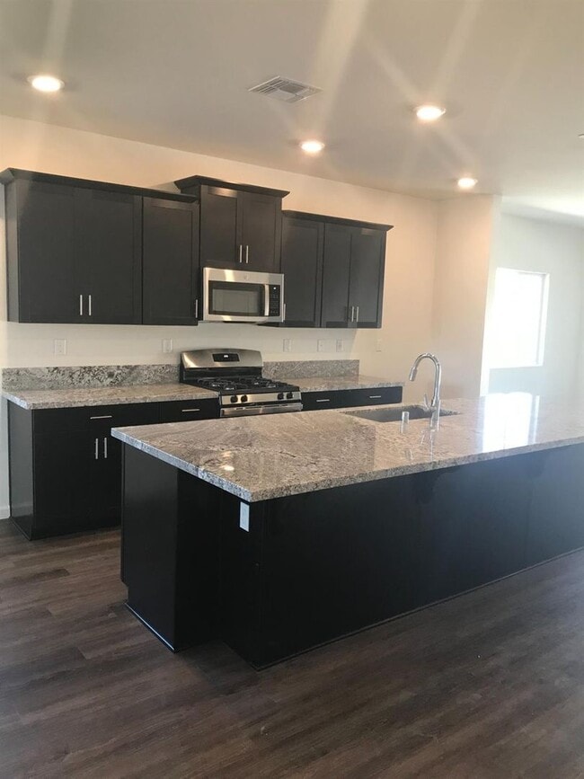 Building Photo - LIVE BIG in the Heart of Fowler! $250 off ...