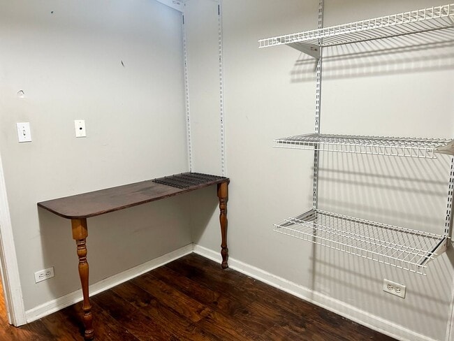 Building Photo - Condo with free heat! In-unit laundry, har...