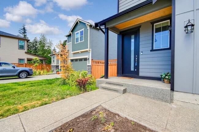 Building Photo - A true stunner in Tehaleh community!