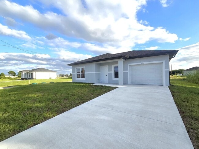 Building Photo - Brand-New 2/2/1 -SW Lehigh Acres-See this ...