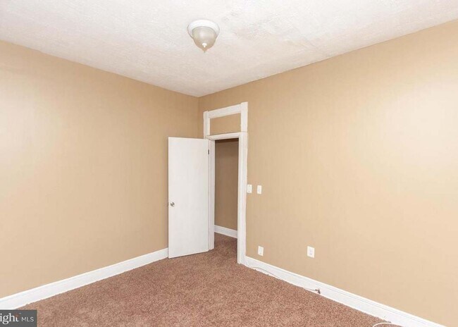 Building Photo - West Baltimore Row Home $99.00 First MONTH...