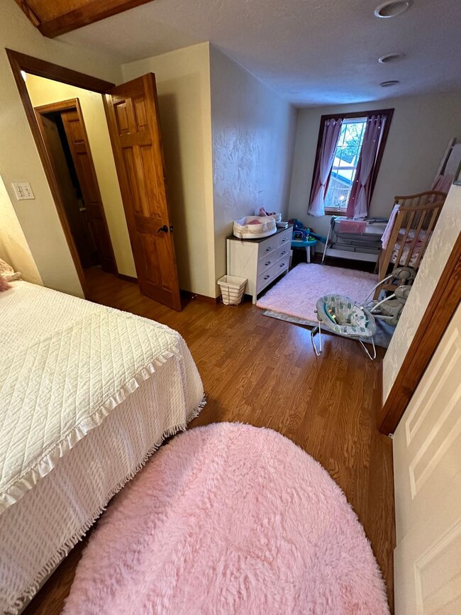 Building Photo - 5 Bedroom 2 1/2 Bath Home w/ Wrap Around P...