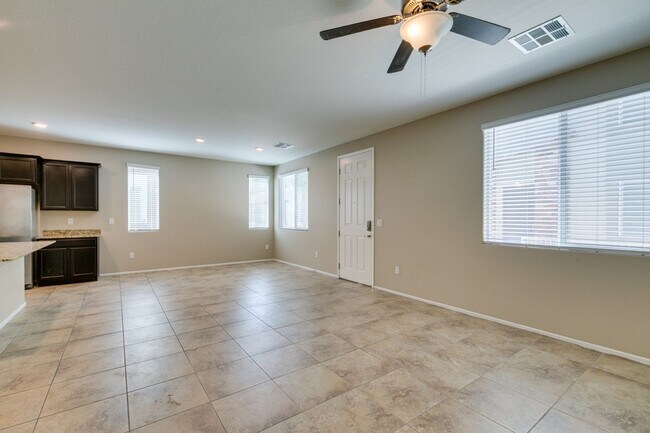 Building Photo - Spacious Townhouse with Loft & Rare 3-Car Garage!