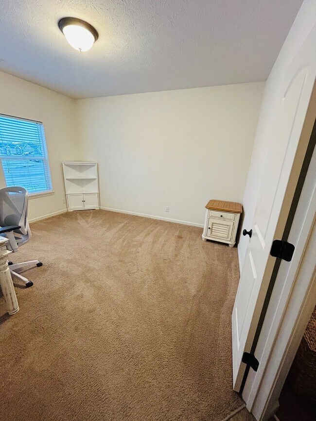 Building Photo - House with Fenced Backyard