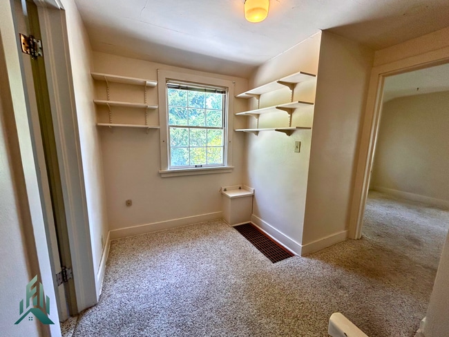 Building Photo - Charming 4 Bedroom Home with Hardwood Floors, Gas Fireplace & Large Fenced Yard