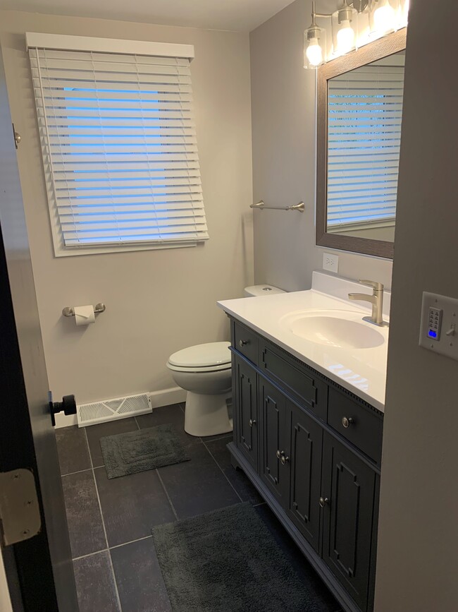 Newly Renovated Bathroom with Tile Floors - 817 Smits St