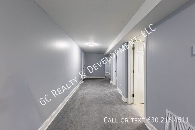 Building Photo - 6433 S Vernon Ave