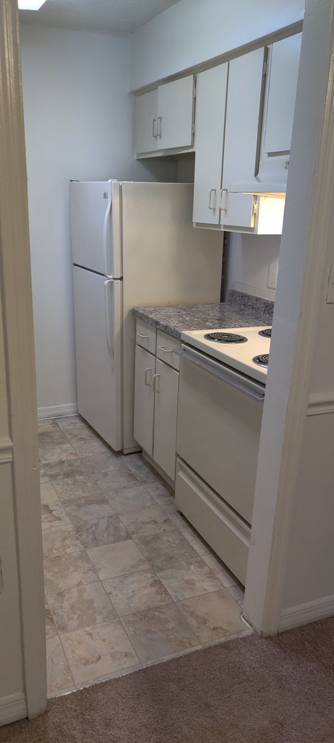 Building Photo - Ground floor One bedroom condo