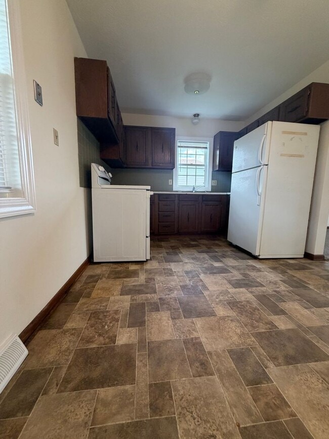 Building Photo - One Bedroom Duplex