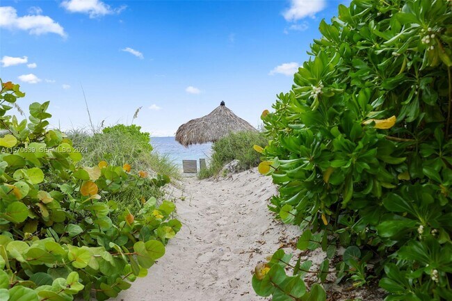 Building Photo - 19144 Fisher Island Dr