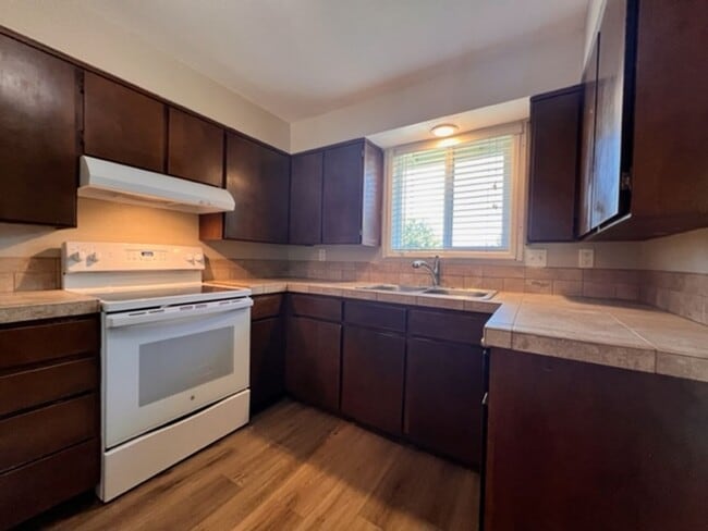 Building Photo - Three bedroom home with large yard| Available July!