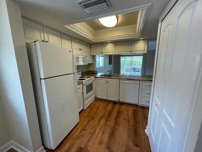 Building Photo - ANNUAL RENTAL - 3 BED / 2 BATH WITH CARPOR...