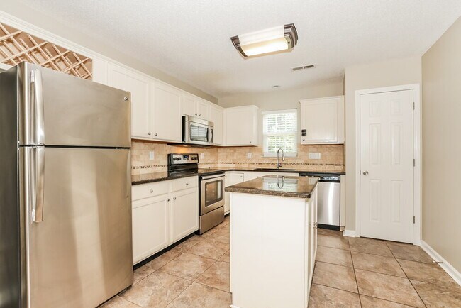 Building Photo - 5209 Carriage Woods Dr