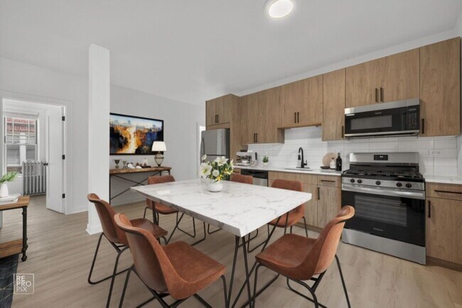 Building Photo - 6975 N Bell Ave