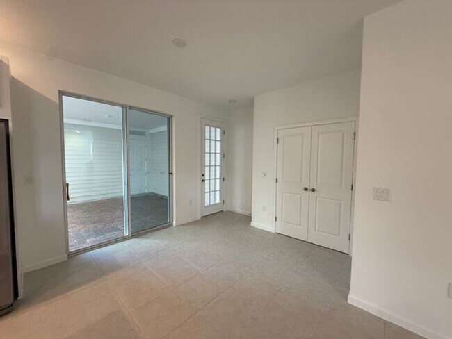 Building Photo - Brand new construction 3 Bedroom Town Home in Island Village of Celebration