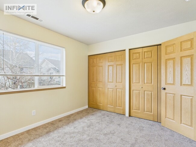 Building Photo - Spacious 2 Bedroom, 2 Bath Condo w/ Detached Garage – Move-In Ready!