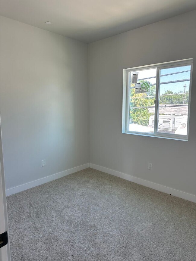 Building Photo - BRAND NEW 2 Bedroom upstairs apartment in ...