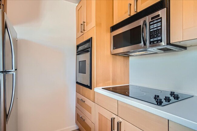 Building Photo - MOVE IN SPECIAL- Live in the Heart of Nort...