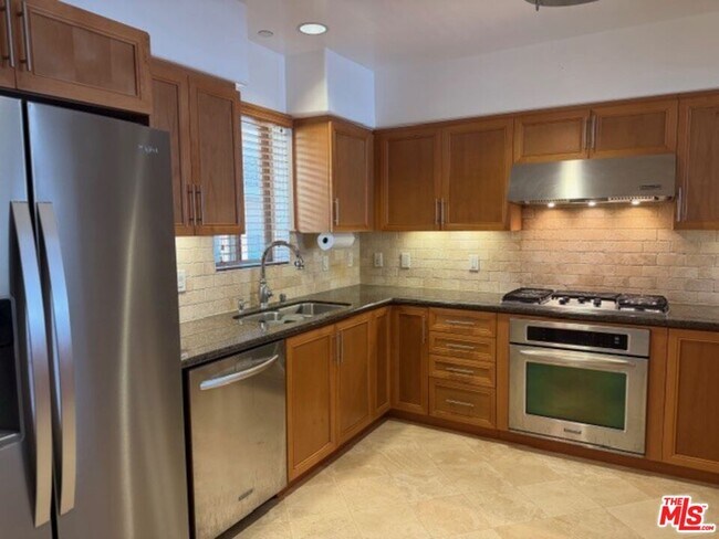 Building Photo - 8238 W Manchester Ave