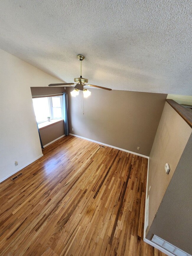 Building Photo - Spacious 4-Bedroom Home with RV Parking in...