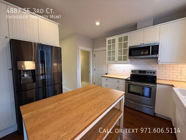 Building Photo - 4887 SE 3rd Ct