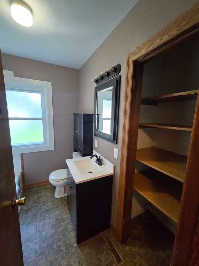 Building Photo - 3 bedroom, large privacy fenced in yard, oversized garage