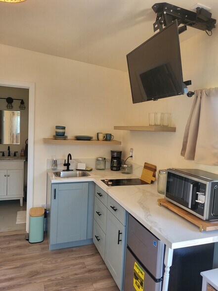 Kitchenette with TV down - 950 Barrett Ave
