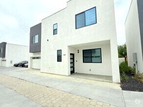 Building Photo - Chic Modern Living in Panorama City – 4 Be...