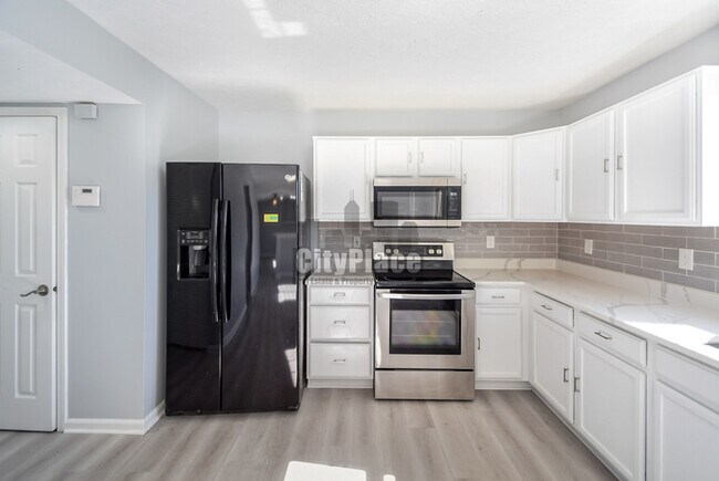 Building Photo - 6677 W Longview Dr