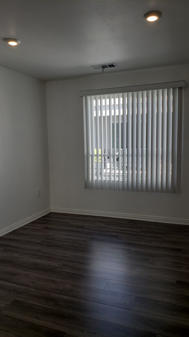 Building Photo - 2057 W Florence Ave